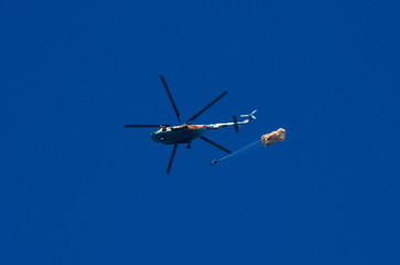 Helicopter and the parachutist