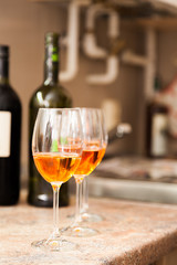 Glasses of rose wine - shallow DOF, enhanced colors