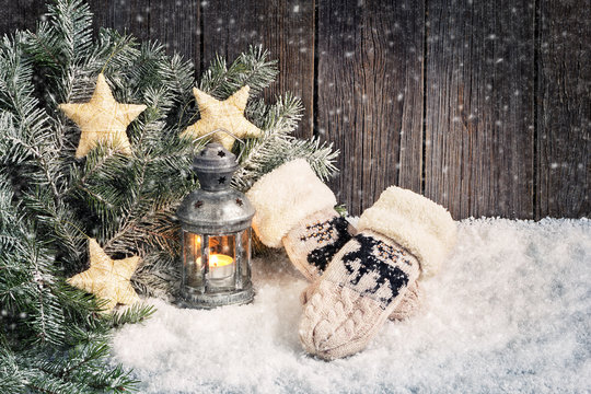 Christmas Background With Lantern, Spruce Branch And Mittens