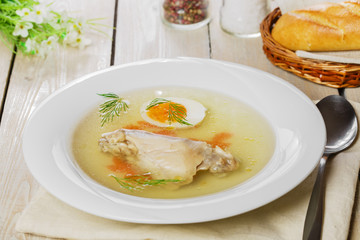 chicken broth with meat and boiled egg