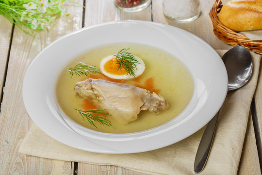 chicken broth with meat and boiled egg