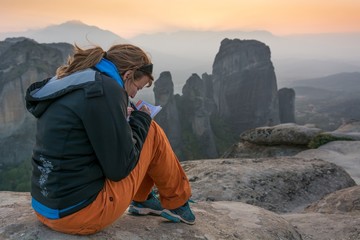 Girl writting her thoughts