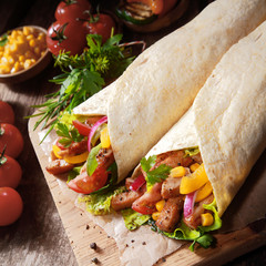 Healthy mexican tortillas with salad and meat