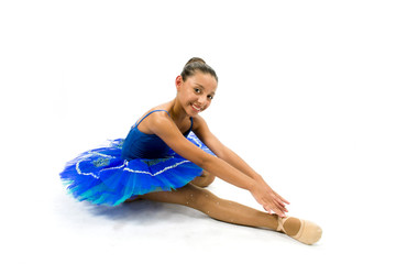 Beautiful ballet dancer with blue dress posing dance