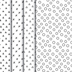 Set of four doodle seamless geometric patterns