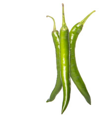 Green chili peppers over white background