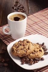 Cookies in plate and coffee cup