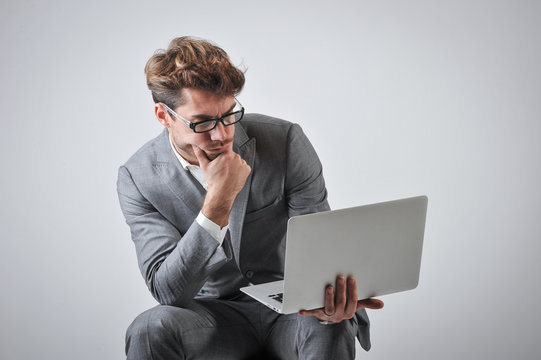 Man With Personal Computer For Business