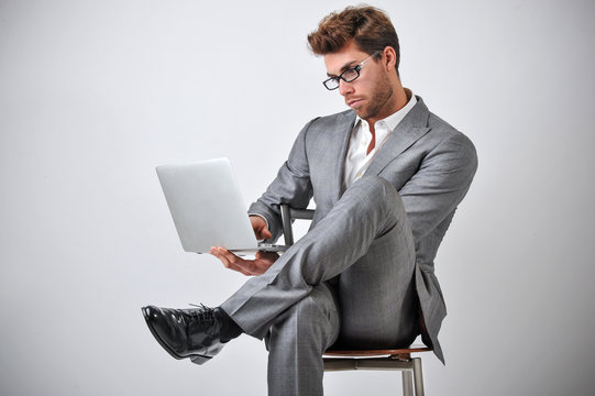 Man With Personal Computer For Business