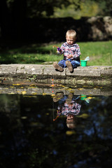 funny boy  catches a fish