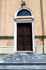 Fototapeta na wymiar italy lombardy in the milano door closed brick paveme