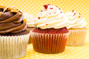 Cupcakes on yellow background