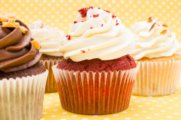 Cupcakes on yellow background