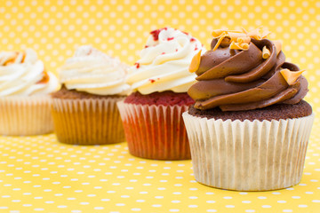 Cupcakes on yellow background