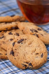 Christmas american cookies with chocolate and tea