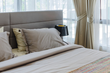 modern bedroom with black lamp