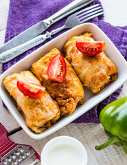 Braised cabbage with meat and rice in tomato sauce