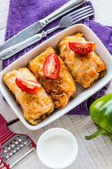 Braised cabbage with meat and rice in tomato sauce