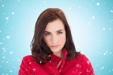 Composite image of portrait of a beautiful brunette in red coat