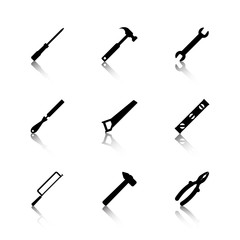 set of black tools with reflection