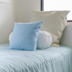 three pillows on kid bed