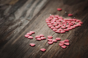 Valentine's day card with heart on wooden background