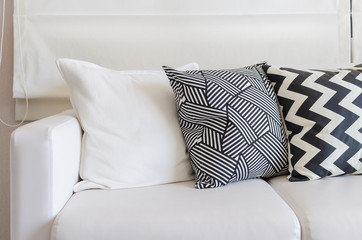 black and white pillows on sofa