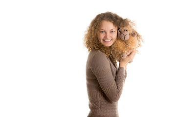 Girl with stuffed toy sheep