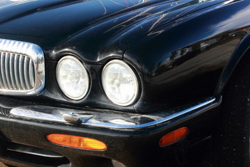 Black Car bonnet and round  Headlights automobile