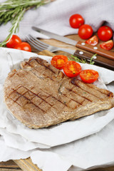 Delicious grilled meat on table