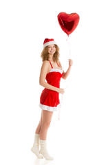 Santa girl standing with heart shaped balloon