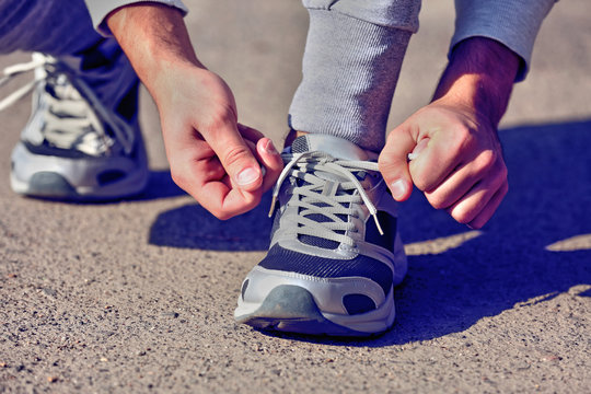 Runner Tying Shoelaces