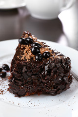Yummy chocolate cake served on table, close-up