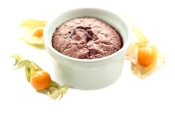 Hot chocolate pudding with fondant centre isolated on white