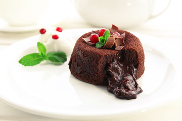Hot chocolate pudding with fondant centre, close-up