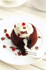 Hot chocolate pudding with fondant centre with ice-cream,