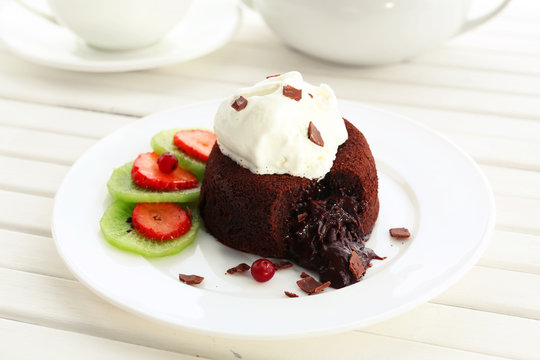 Hot chocolate pudding with fondant centre with ice-cream,