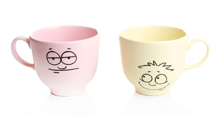 Emotional cups isolated on white