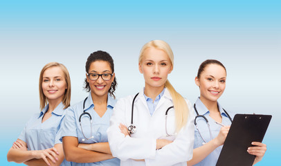 team or group of female doctors and nurses