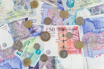 British pounds banknotes and coins background