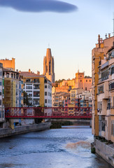 Fototapeta na wymiar Girona Cathedral with Eiffel bridge over the Onyar river - Spain