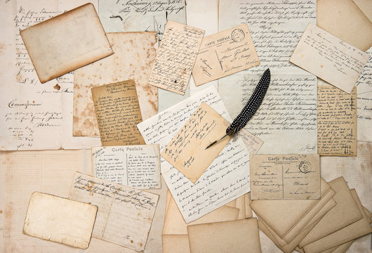 letters, handwritings, vintage postcards and feather pen