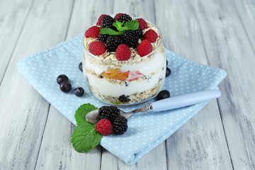 Healthy breakfast - yogurt with  fresh fruit, berries and