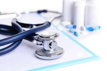 Stethoscope on light background