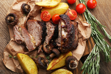 Delicious grilled meat on table