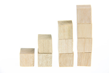 Wooden toy blocks isolated on white background