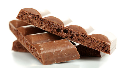 Tasty porous chocolate, isolated on white