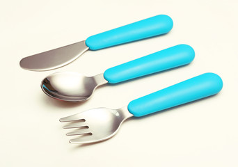 Blue baby cutlery isolated on white