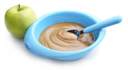 Baby food in bowl isolated on white