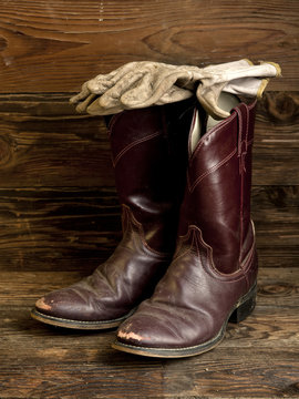 Rustic image of boots and gloves.